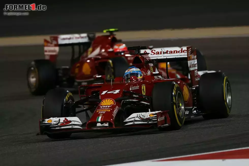 Foto zur News: Fernando Alonso (Ferrari) und Kimi Räikkönen (Ferrari)