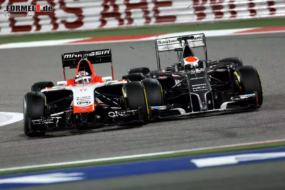 Foto zur News: Jules Bianchi (Marussia) und Adrian Sutil (Sauber)