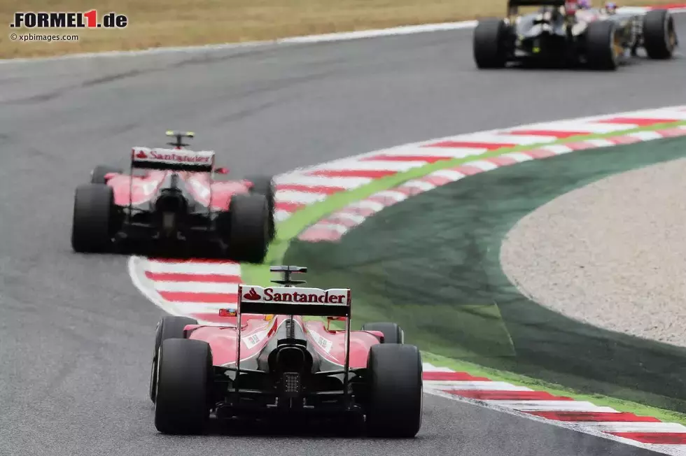 Foto zur News: Fernando Alonso (Ferrari) und Kimi Räikkönen (Ferrari)