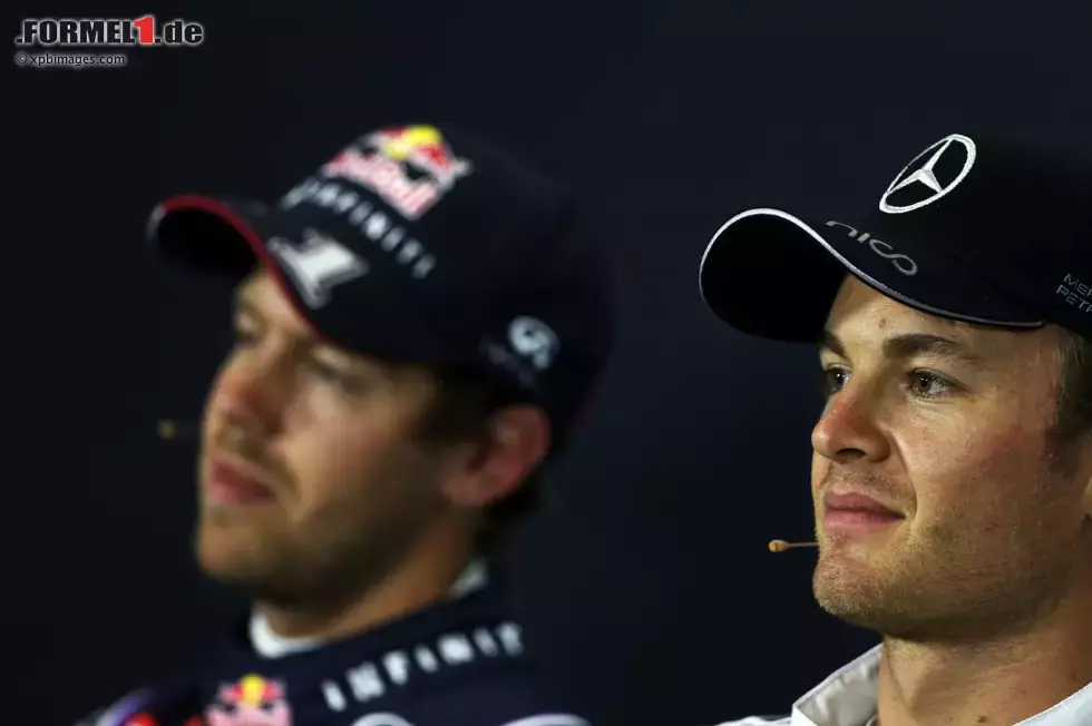 Foto zur News: Nico Rosberg (Mercedes) und Sebastian Vettel (Red Bull)