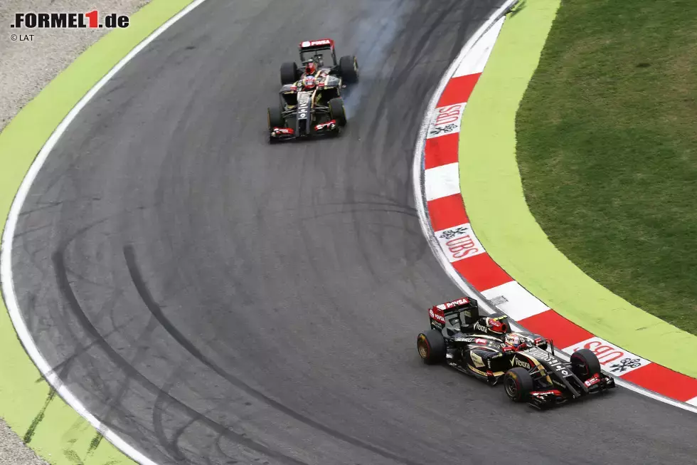 Foto zur News: Pastor Maldonado (Lotus) und Romain Grosjean (Lotus)