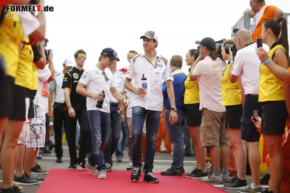 Foto zur News: Adrian Sutil (Sauber) und Nico Rosberg (Mercedes)