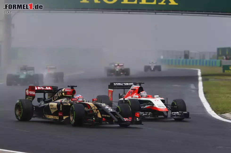 Foto zur News: Romain Grosjean (Lotus) und Jules Bianchi (Marussia)