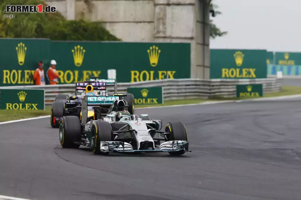 Foto zur News: Nico Rosberg (Mercedes) und Sebastian Vettel (Red Bull)