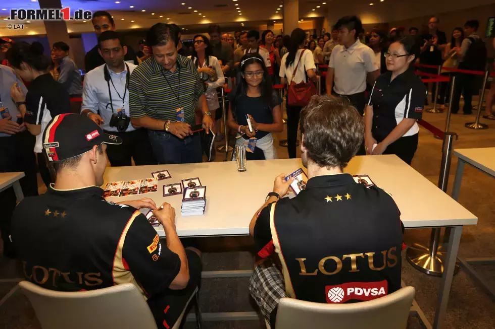 Foto zur News: Romain Grosjean (Lotus) und Pastor Maldonado (Lotus)