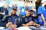 Foto zur News: Daniel Ricciardo (Red Bull) und Sebastian Vettel (Red Bull)