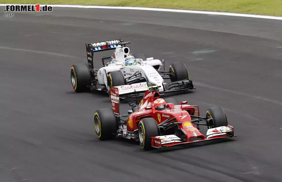 Foto zur News: Kimi Räikkönen (Ferrari) und Felipe Massa (Williams)