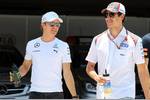 Foto zur News: Nico Rosberg (Mercedes) und Adrian Sutil (Sauber)
