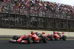 Foto zur News: Kimi Räikkönen (Ferrari) und Fernando Alonso (Ferrari)