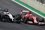 Foto zur News: Jenson Button (McLaren) und Kimi Räikkönen (Ferrari)