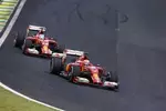 Foto zur News: Kimi Räikkönen (Ferrari) und Fernando Alonso (Ferrari)