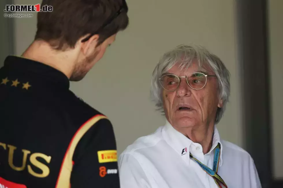 Foto zur News: Romain Grosjean (Lotus) und Bernie Ecclestone