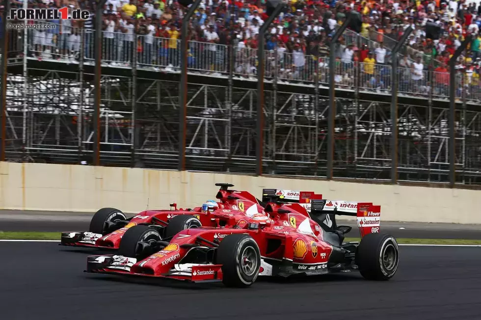 Foto zur News: Fernando Alonso (Ferrari) und Kimi Räikkönen (Ferrari)