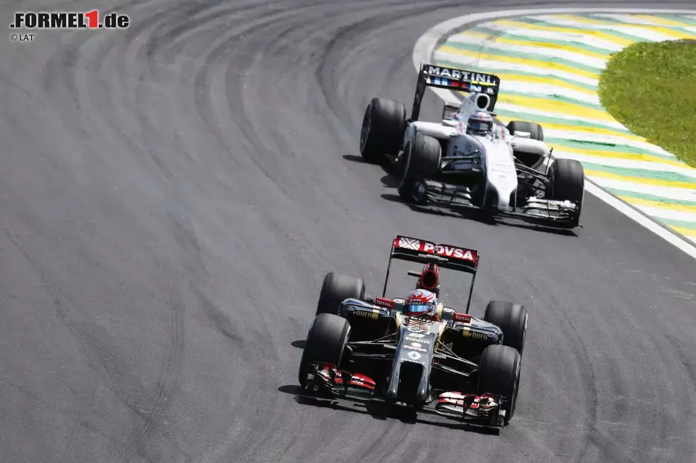 Foto zur News: Romain Grosjean (Lotus) und Valtteri Bottas (Williams)