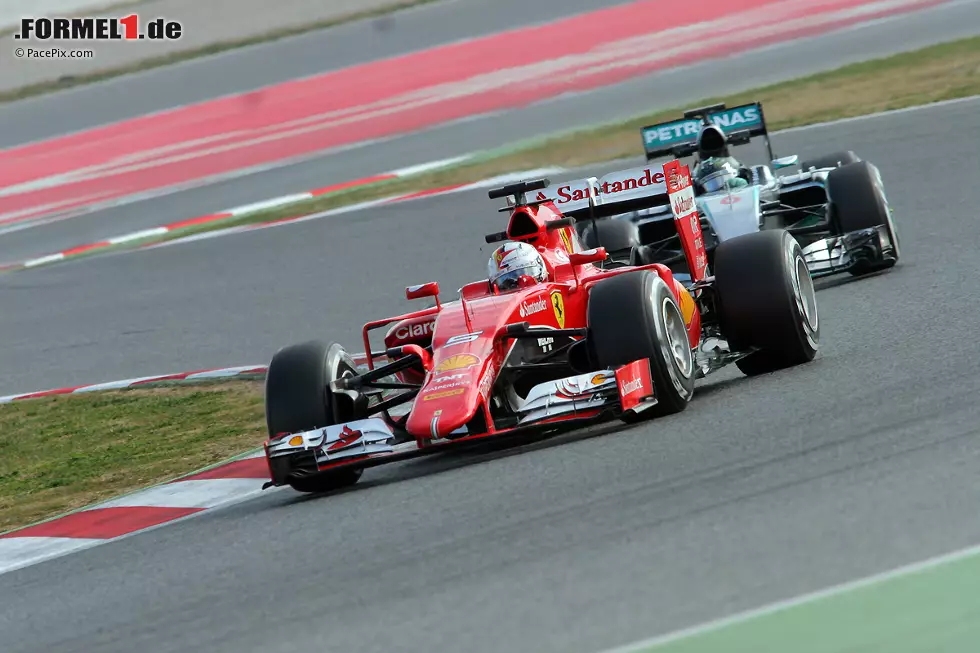 Foto zur News: Sebastian Vettel (Ferrari) und Nico Rosberg (Mercedes)