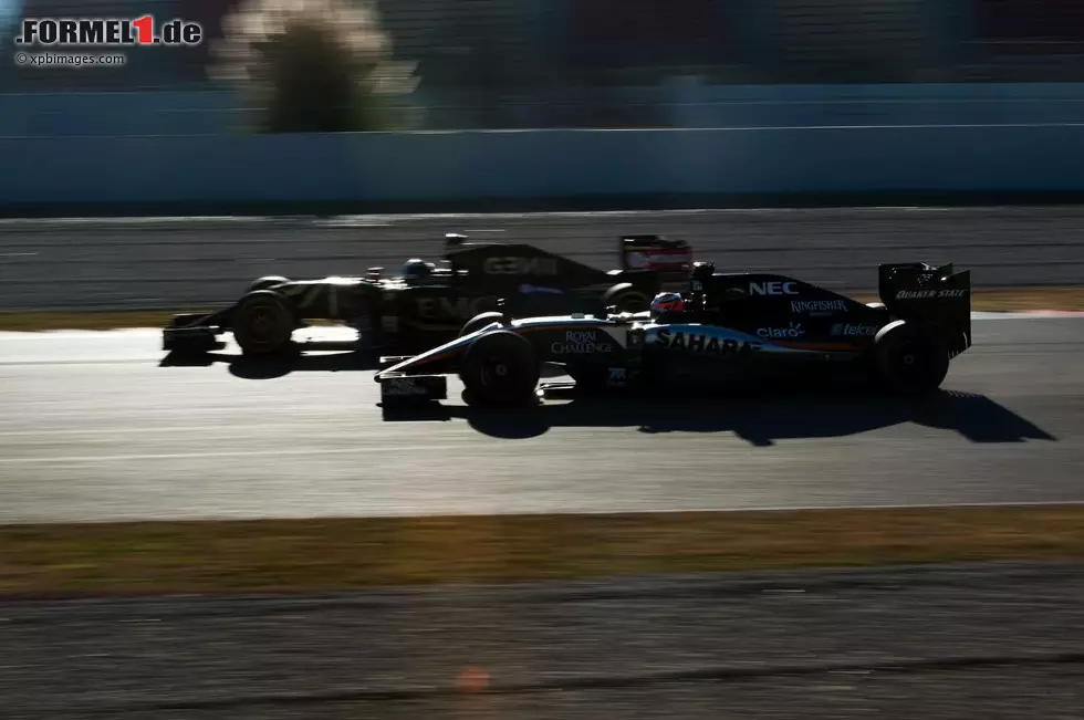 Foto zur News: Romain Grosjean (Lotus) und Nico Hülkenberg (Force India)