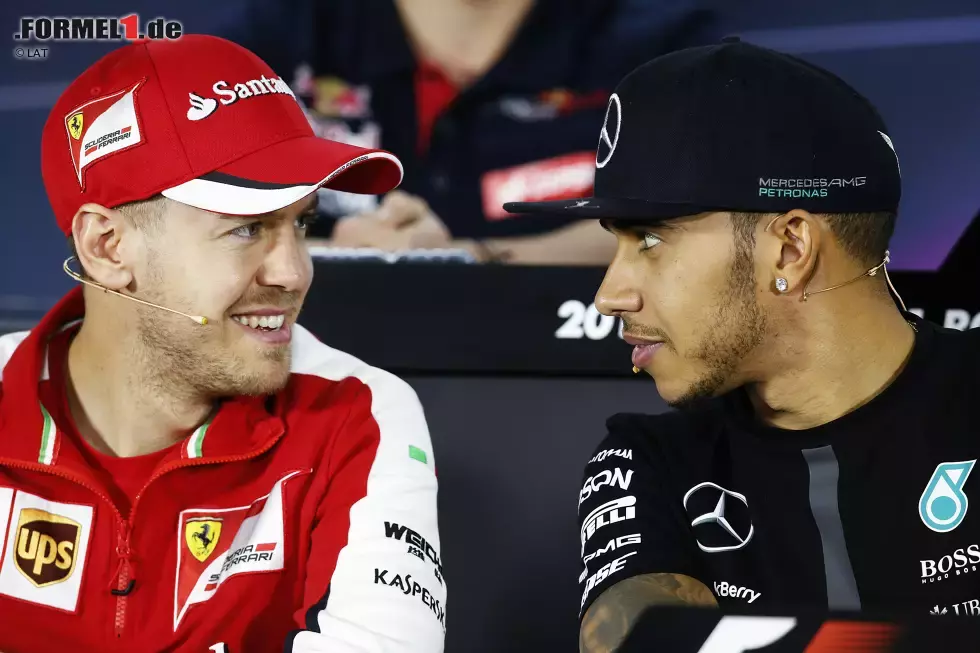 Foto zur News: Sebastian Vettel (Ferrari) und Lewis Hamilton (Mercedes)