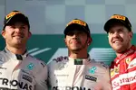 Foto zur News: Nico Rosberg (Mercedes), Lewis Hamilton (Mercedes) und Sebastian Vettel (Ferrari)