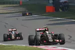 Foto zur News: Pastor Maldonado (Lotus) und Romain Grosjean (Lotus)