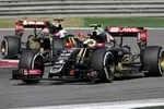 Foto zur News: Pastor Maldonado (Lotus) und Romain Grosjean (Lotus)