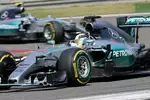 Foto zur News: Lewis Hamilton (Mercedes) und Nico Rosberg (Mercedes)