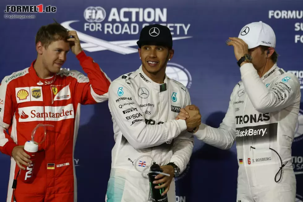 Foto zur News: Lewis Hamilton (Mercedes), Sebastian Vettel (Ferrari) und Nico Rosberg (Mercedes)