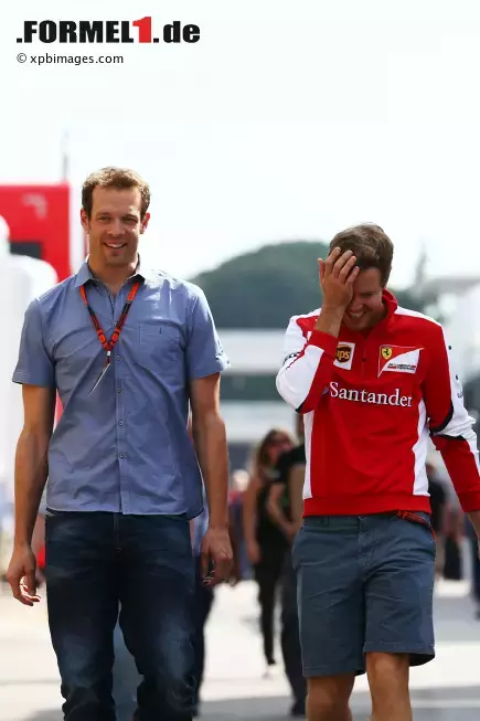 Foto zur News: Alexander Wurz (Toyota) und Sebastian Vettel (Ferrari)