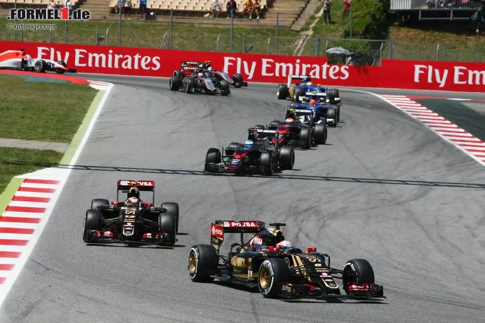 Foto zur News: Romain Grosjean (Lotus) und Pastor Maldonado (Lotus)