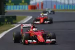 Foto zur News: Sebastian Vettel (Ferrari) und Kimi Räikkönen (Ferrari)