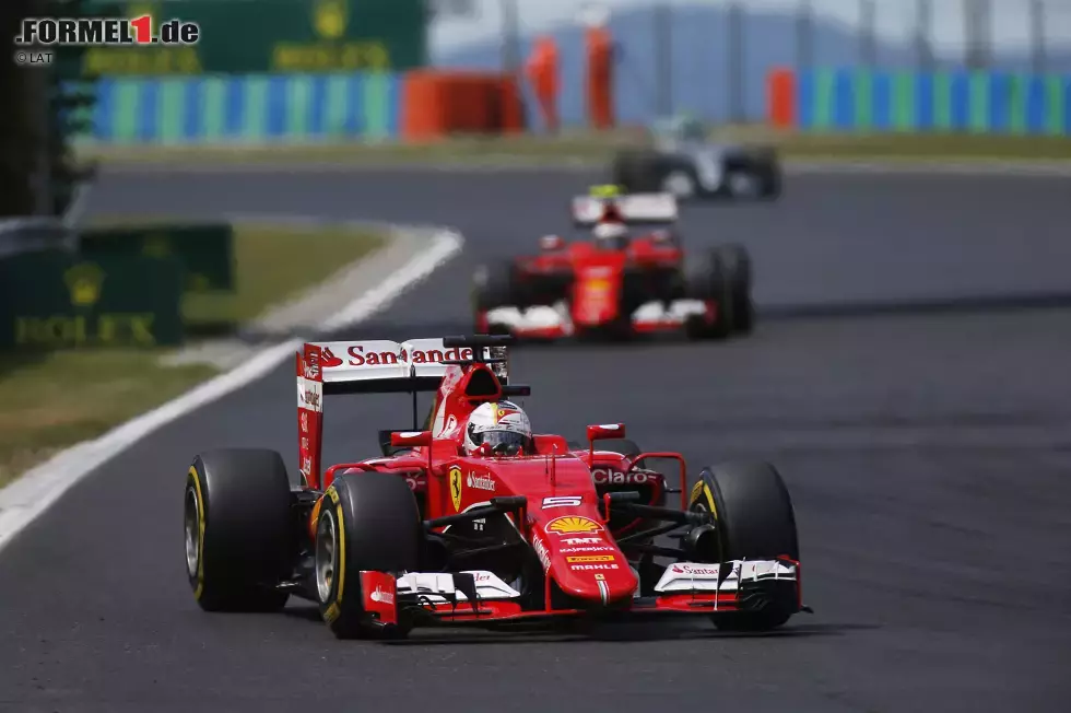 Foto zur News: Sebastian Vettel (Ferrari) und Kimi Räikkönen (Ferrari)