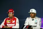 Foto zur News: Sebastian Vettel (Ferrari) und Lewis Hamilton (Mercedes)