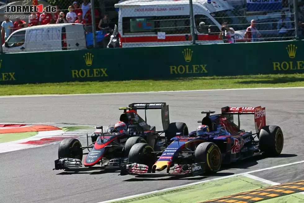 Foto zur News: Max Verstappen (Toro Rosso) und Jenson Button (McLaren)