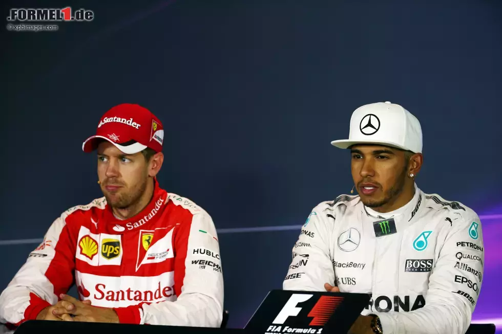 Foto zur News: Sebastian Vettel (Ferrari) und Lewis Hamilton (Mercedes)