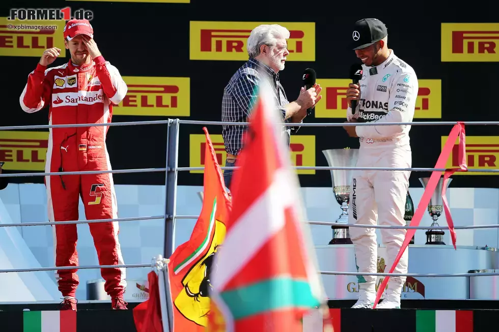 Foto zur News: Sebastian Vettel (Ferrari) und Lewis Hamilton (Mercedes)