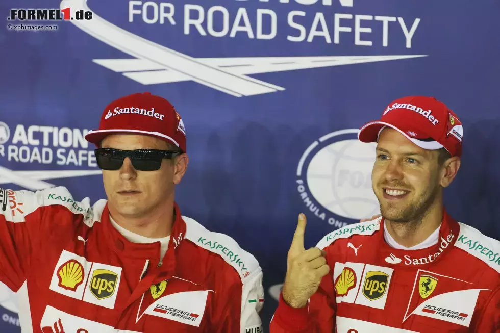 Foto zur News: Sebastian Vettel (Ferrari) und Kimi Räikkönen (Ferrari)