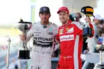 Foto zur News: Lewis Hamilton (Mercedes) und Sebastian Vettel (Ferrari)