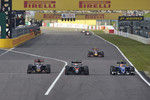 Foto zur News: Max Verstappen (Toro Rosso), Felipe Nasr (Sauber) und Jenson Button (McLaren)