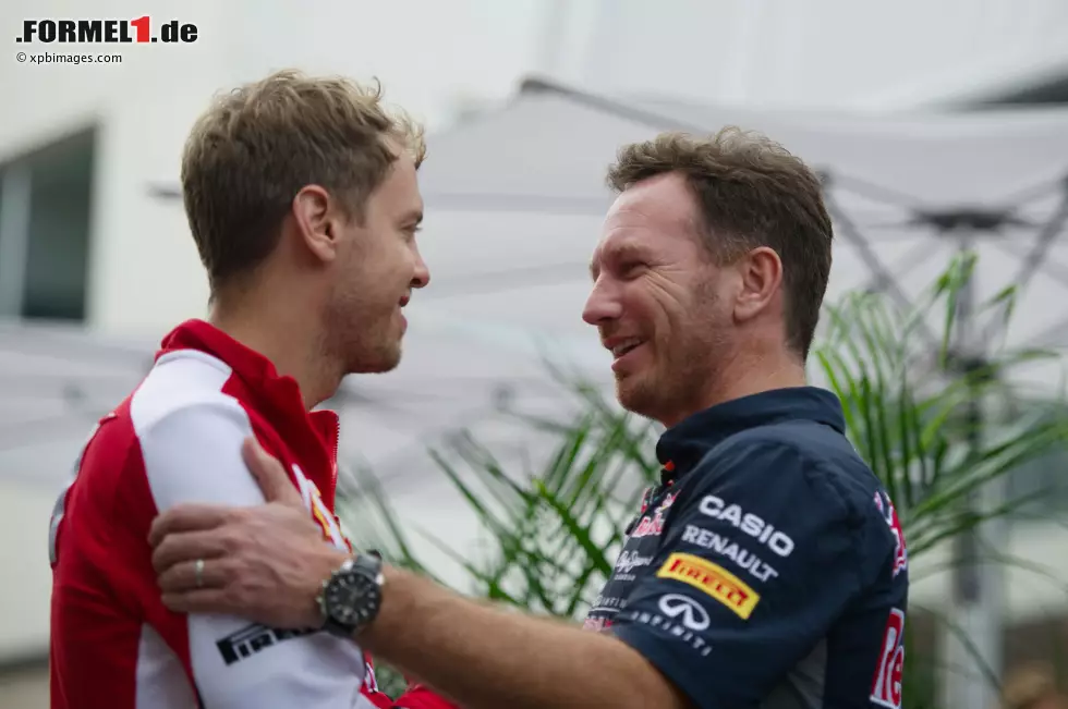 Foto zur News: Sebastian Vettel (Ferrari) und Christian Horner