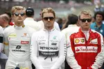 Foto zur News: Marcus Ericsson (Sauber), Nico Rosberg (Mercedes) und Kimi Räikkönen (Ferrari)