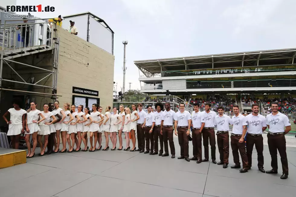 Foto zur News: Grid-Girls &amp; -Boys