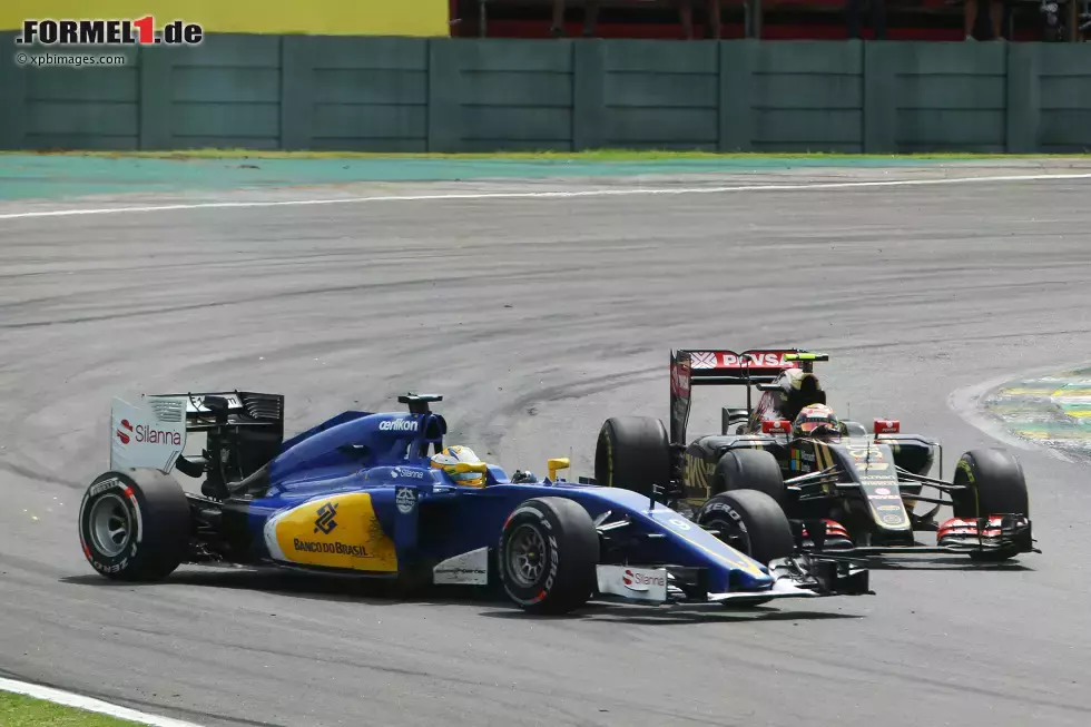 Foto zur News: Pastor Maldonado (Lotus) und Marcus Ericsson (Sauber)