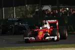 Foto zur News: Sebastian Vettel (Ferrari) und Nico Rosberg (Mercedes)