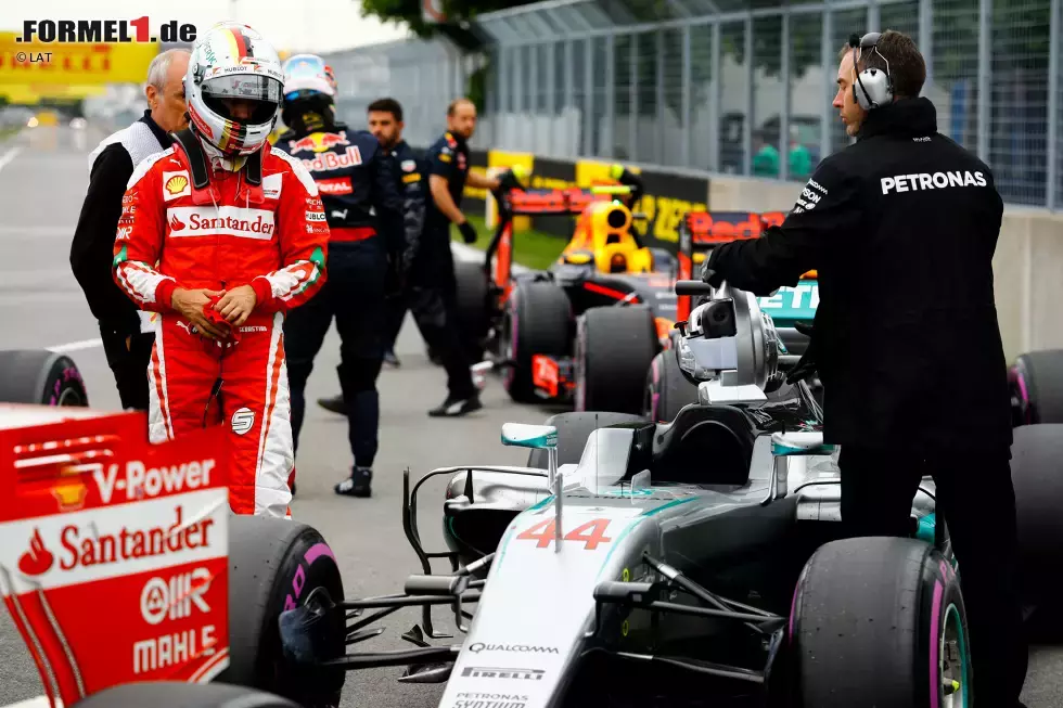 Foto zur News: Sebastian Vettel (Ferrari) und Lewis Hamilton (Mercedes)