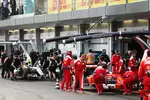 Foto zur News: Sebastian Vettel (Ferrari) und Nico Rosberg (Mercedes)