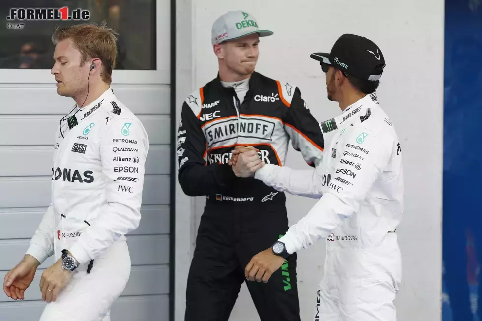 Foto zur News: Nico Hülkenberg (Force India) und Lewis Hamilton (Mercedes)