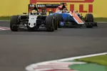 Foto zur News: Sergio Perez (Force India) und Pascal Wehrlein (Manor)