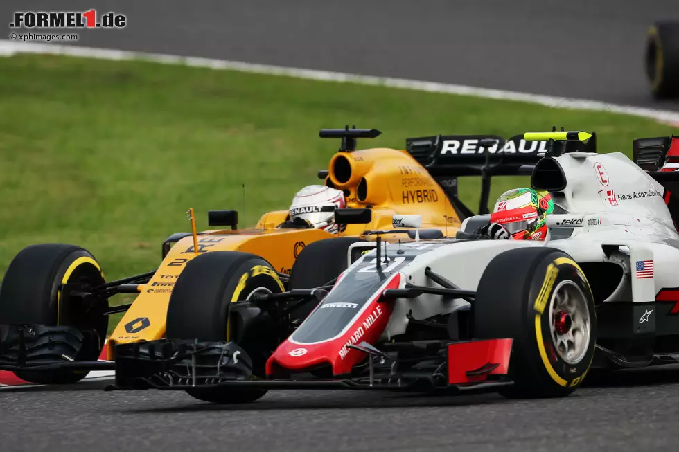 Foto zur News: Esteban Gutierrez (Haas) und Kevin Magnussen (Renault)