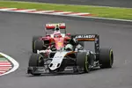 Foto zur News: Nico Hülkenberg (Force India) und Kimi Räikkönen (Ferrari)