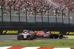 Foto zur News: Esteban Gutierrez (Haas) und Carlos Sainz (Toro Rosso)