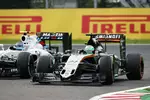 Foto zur News: Nico Hülkenberg (Force India) und Valtteri Bottas (Williams)